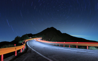 Long exposure road mountain night 2 - a mountain in the background free wallpaper for desktop