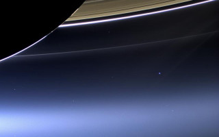 Saturn hubble blue streak distant - a distant star in the foreground free wallpaper