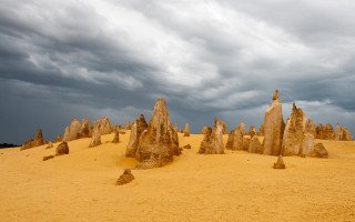 Rocks desert cloudy sky person - elizabeth durack free wallpaper