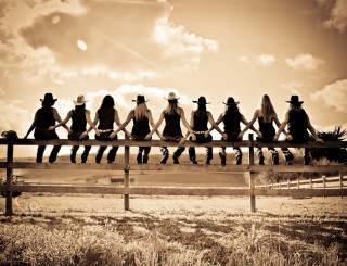 Group cowboys sitting fence hats - western free wallpaper