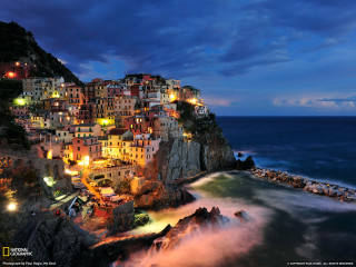 Town cliff ocean night lights - a town free wallpaper