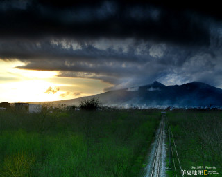 Train track field mountain sunset - a train track free wallpaper for desktop