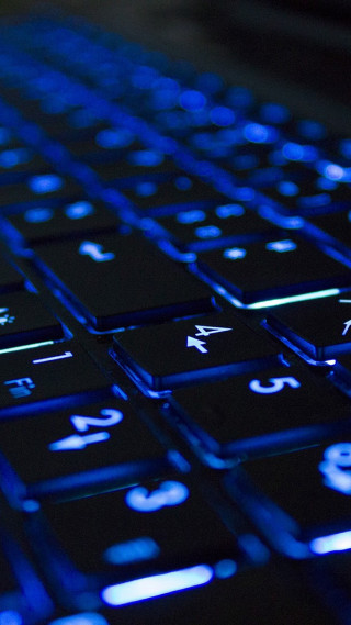Close up blue light keyboard - technology free wallpaper for mobile