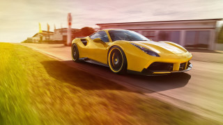 Yellow sports car road building - a yellow sports car free wallpaper