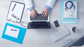 Person typing laptop medical office - medical free wallpaper