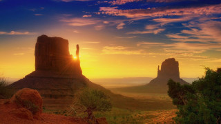 Sunset desert rock formation mountain - a rock formation in the foreground free wallpaper