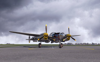 Small airplane runway cloudy sky - a yellow stripe free wallpaper