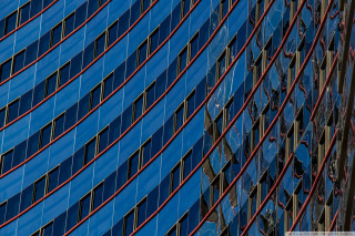 Blue glass facade clock red - sharp high detail free wallpaper