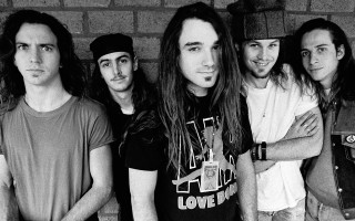 Group men brick wall crossed - post grunge free wallpaper