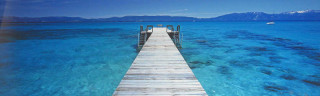 Pier ocean boat mountains beach - land art free wallpaper