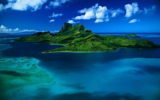 Small island water clouds plane 2 - a small island free wallpaper