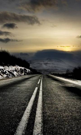 Snowy road mountain cloudy sky - beautiful landscape free wallpaper for mobile