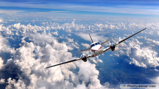 Small airplane flying above clouds 2 - isometric view free wallpaper