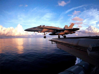 Fighter jet ocean cloudy landing 3 - carl walter liner free wallpaper