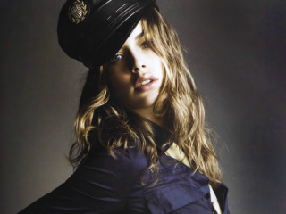 Woman hat blue shirt studio - a picture in a studio setting free wallpaper