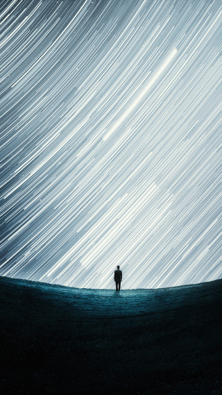 Lone person field star trail - liminal free wallpaper for mobile