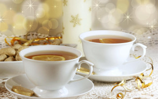 Tea cups gold decorations candle - a snowflake free wallpaper