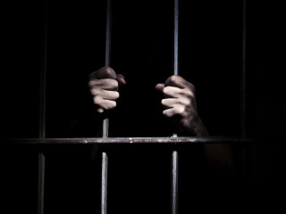 Person holding jailcell bars dark - figuration libre free wallpaper