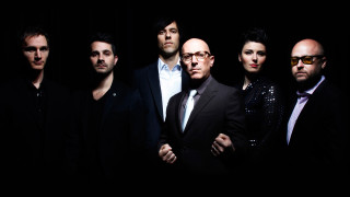 Men group dark room suit - one man free wallpaper