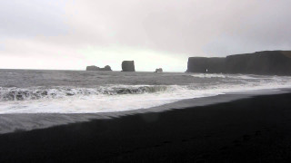 Black beach waves crashing rock - wave free wallpaper