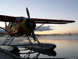 Small plane lake dock person - top of a lake next free wallpaper