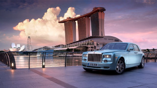 Rolls royce city skyline sunset - luxury free wallpaper