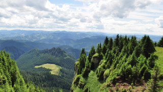 Valley trees mountains clouds sky - a view of a valley free wallpaper