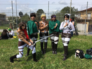 Group people lush green field - cosplay free wallpaper