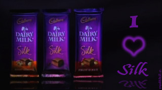Three dairy milk bars purple - the other side free wallpaper