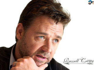 Man suit tie serious expression 6 - a man in a suit free wallpaper