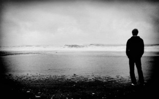 Man beach ocean wave standing 3 - chris friel free wallpaper
