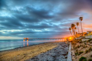 Beach pier palm trees sunset - a few building free wallpaper for desktop