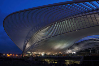Large building curved roof nighttime - colijn de coter free wallpaper