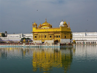Large building yellow dome lake - a few person free wallpaper