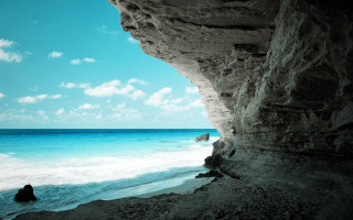 Beach cliff ocean blue sky - above them free wallpaper for desktop