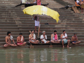 Men sitting steps water umbrella - a body of water free wallpaper