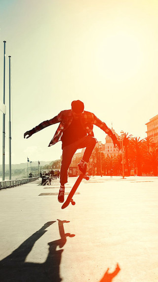 Man skateboard trick air arms - free retro wallpaper for mobile