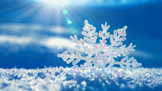 Snowflake sunshine snow field clouds - a snowflake free wallpaper