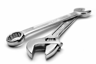 Wrench pliers white surface background - mechanical free wallpaper