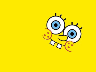 Yellow cartoon face happy eyes - a cartoon face free wallpaper for desktop