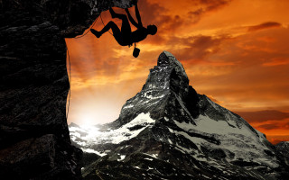 Man climbing mountain rope red 2 - extreme free wallpaper