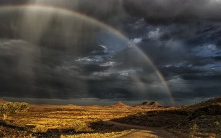 Rainbow dirt road desert cloudy - a rainbow free wallpaper