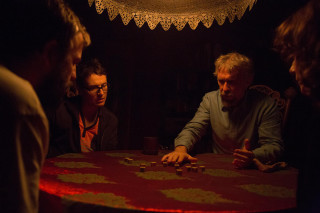 Group people playing cards dark - david annand free wallpaper