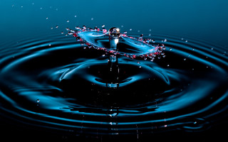 Blue liquid droplet water black - a macro photograph free wallpaper