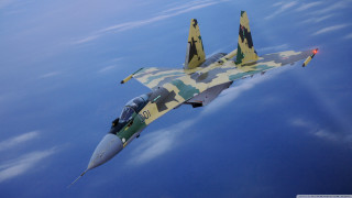 Camouflaged fighter jet flying sky 3 - its tail free wallpaper
