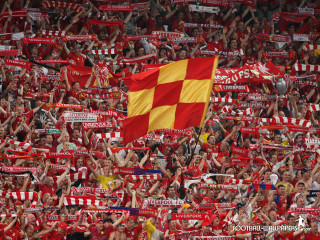 Crowd red yellow flags banners - a stadium free wallpaper