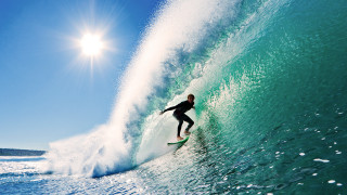 Surfboard riding ocean wave sunshine - a person riding free wallpaper