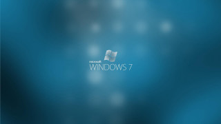 Blue windows7 logo blurry background - bill traylor free wallpaper