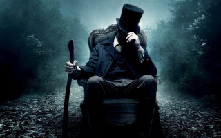 Man top hat coat sitting 4 - a man in a top hat free wallpaper