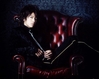 Man sitting red chair sword - a red chair free wallpaper